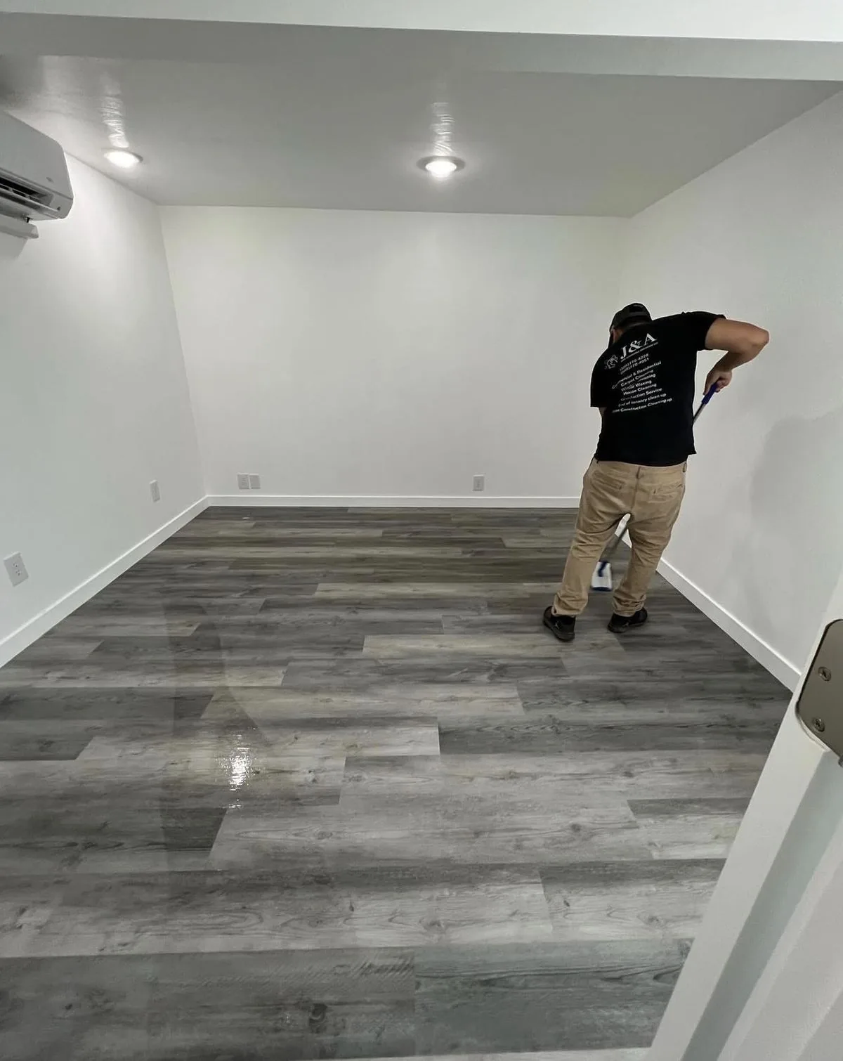 J&A team member caring for a finished hard floor